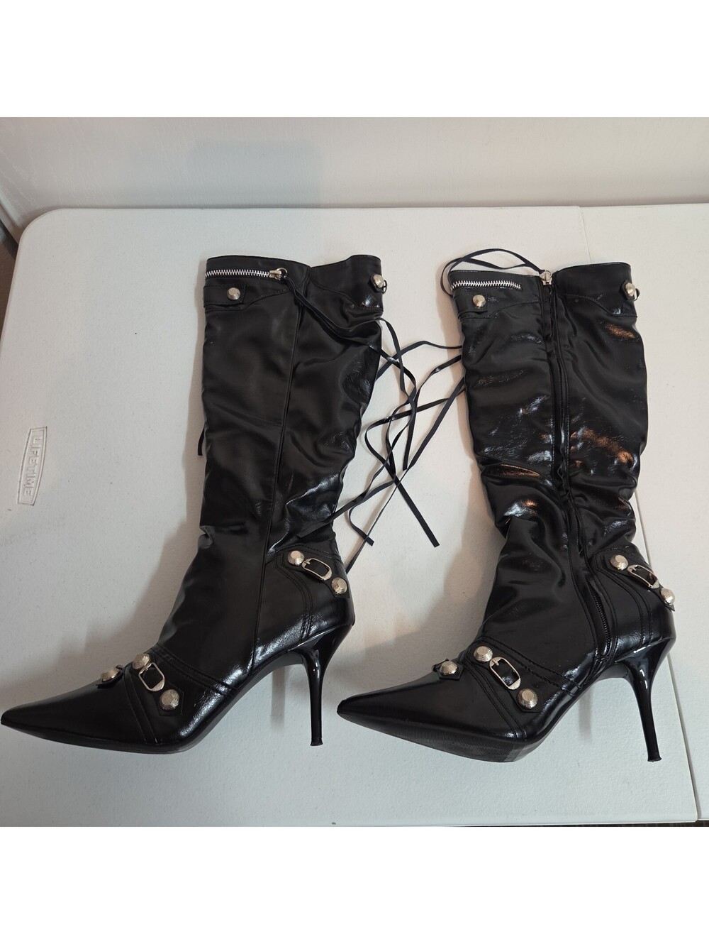 women's black knee-high stiletto boots by Xing WangFaDa size 9.5